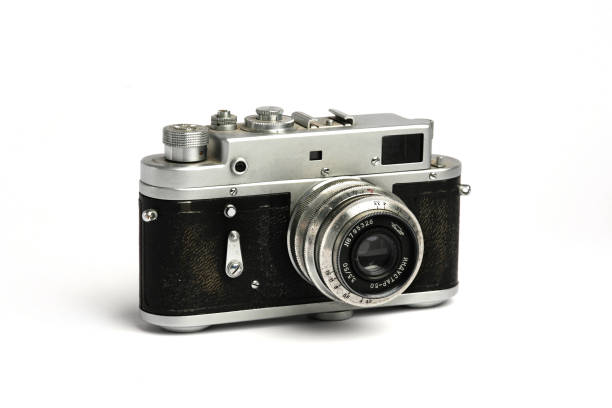 Vintage old Soviet photo camera Vintage old Soviet photo camera on white historical geopolitical location photos stock pictures, royalty-free photos & images