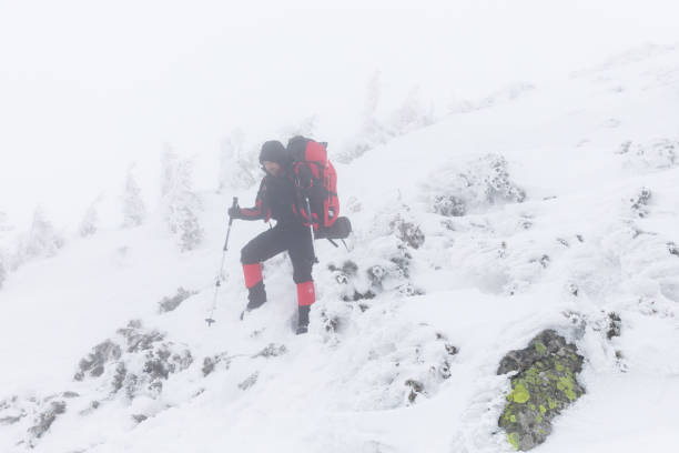 istock A lonely backpacker descending a snowcapped hill in the Carpathians 946927860