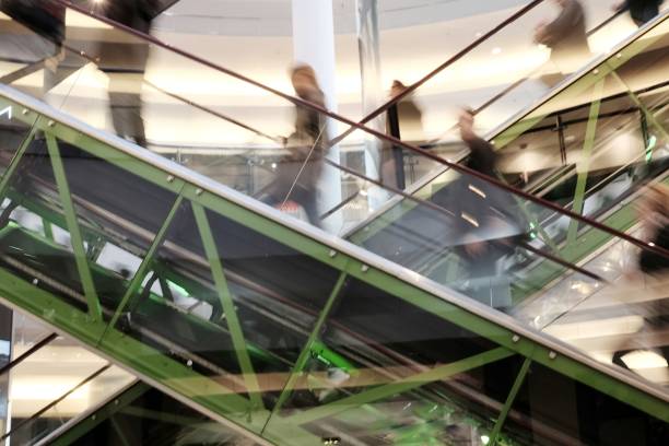 istock people out of focus on escalator 946931184
