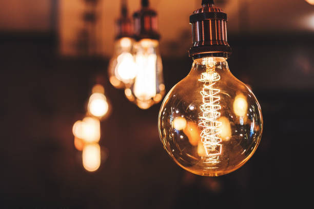 istock incandescent lamp with an unusual spiral 946931750