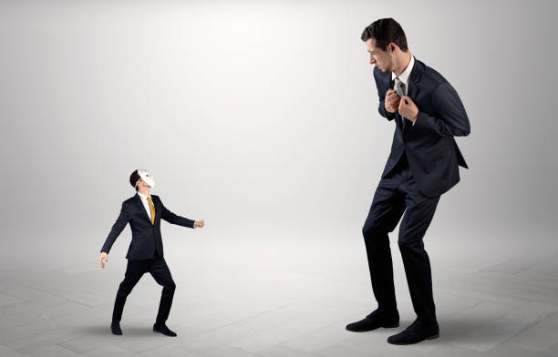 istock Conflict between small and big businessman 946935450