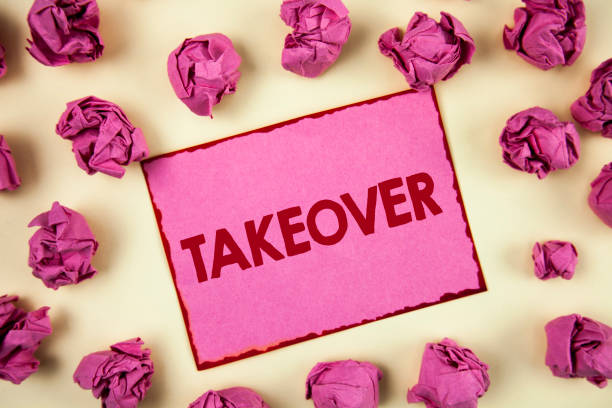 istock Conceptual hand writing showing Takeover. Business photo showcasing Assuming control of something Corporate purchase strategy written on Sticky Note Paper on plain background Paper Balls. 946936998