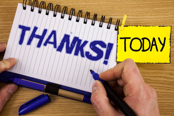 istock Word writing text Thanks Motivational Call. Business concept for Appreciation greeting Acknowledgment Gratitude written by Marker in Hand on Notebook on wooden background Today Pen next to it. 946938272