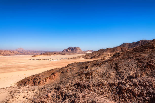 istock Distant houses in desert on Sinai peninsula 946938512