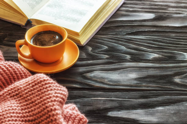 istock open book cup with coffee on a wooden background with copy space, top view 946946194