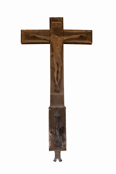 istock Wooden cross isolated on white 946948588