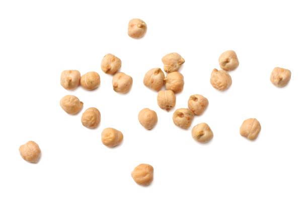 istock chickpeas isolated on white background. top view 946952526
