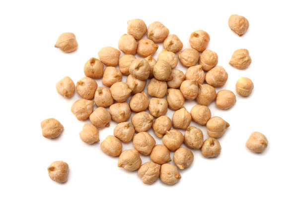 istock chickpeas isolated on white background. top view 946952528