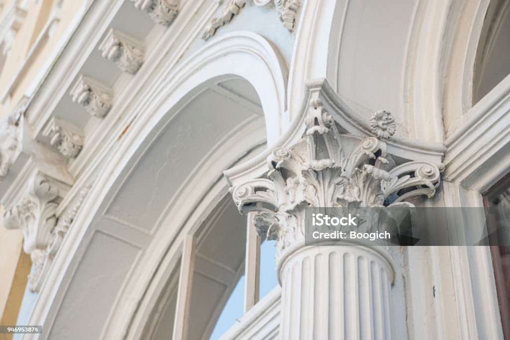 Corinthian Column Capital Architecture Detail in Historic Charleston South Carolina This is a color photograph of historic architecture with an elaborate Corinthian style capital on a column in the exterior of a building in historic Charleston, South Carolina, a travel destination in the Southern USA. Architecture Stock Photo