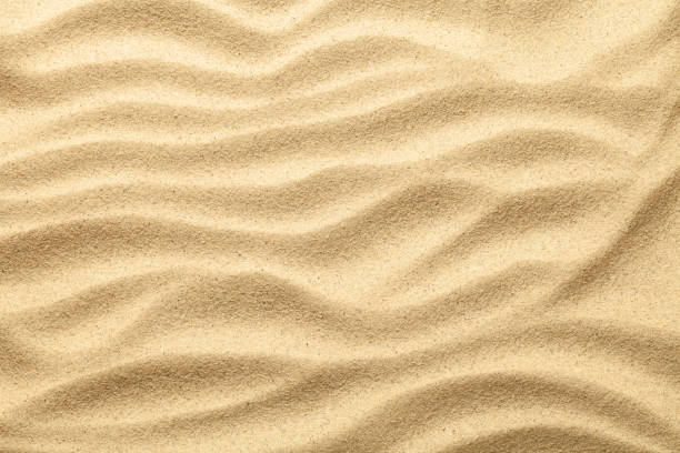 textura arena para el fondo de verano - sand pattern fotografías e imágenes de stock