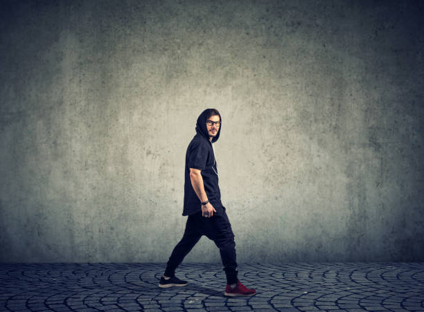 istock Trendy man in sportswear on gray 946965822