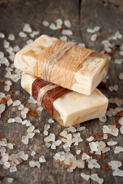 istock Natural soap and  salt on  wooden board 946965986