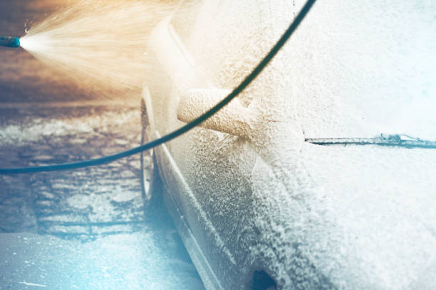 istock Car wash with flowing water and foam. 946969078
