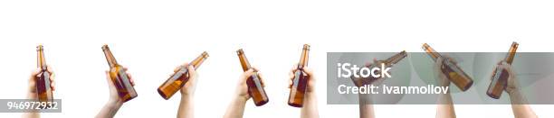 Hands Holding Bottles Of Beer Stock Photo - Download Image Now - Beer - Alcohol, Hand, Bottle