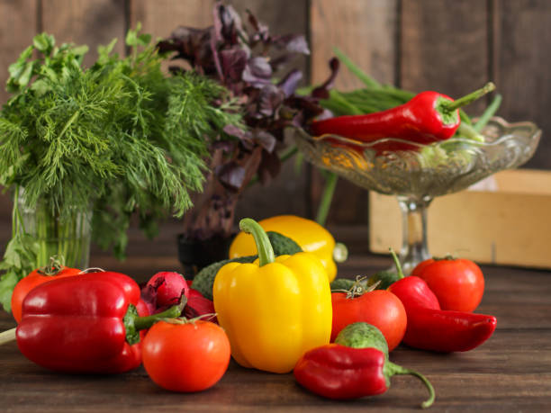 istock vegetables - a set of ingredients for salad (tomato, cucumber, radish, pepper, arugula, basil, parsley, dill, herbs, herbs, radish and others) 946975846
