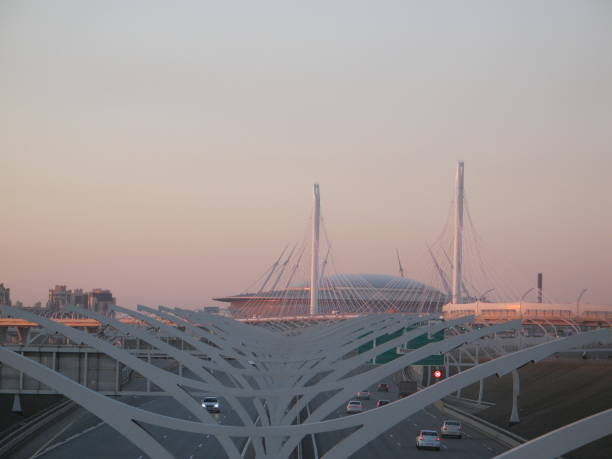 istock Motorway in town off the coast at sunset 946976946