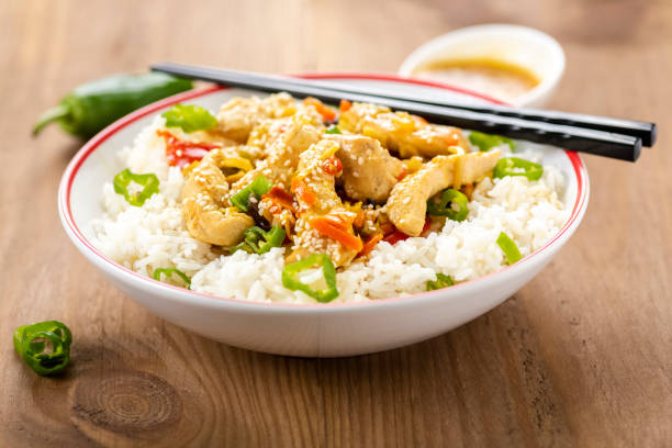 istock rice with chicken and vegetables 946977724