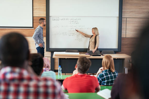 istock College student discussing with mature professor 946980026