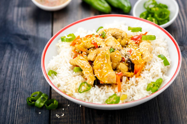 istock rice with chicken and vegetables 946981260