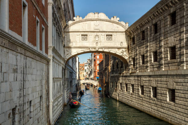 istock Gondolas in the canals of Venice, Italy, 2016 946988210