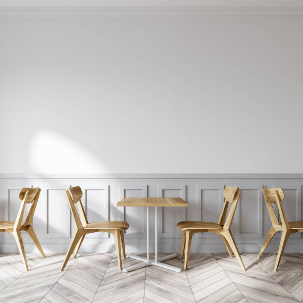 istock Modern white coffee shop, wooden chairs 946989432