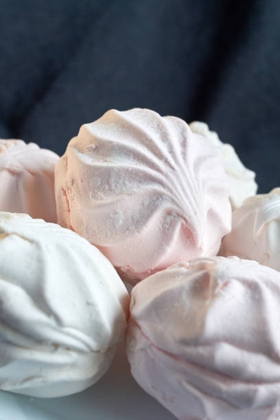 istock White zephyr marshmallow on porcelain plate 947007382