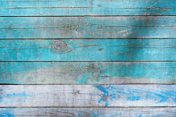 istock Wooden rustic pattern - old boards with remains of blue paint 947014384