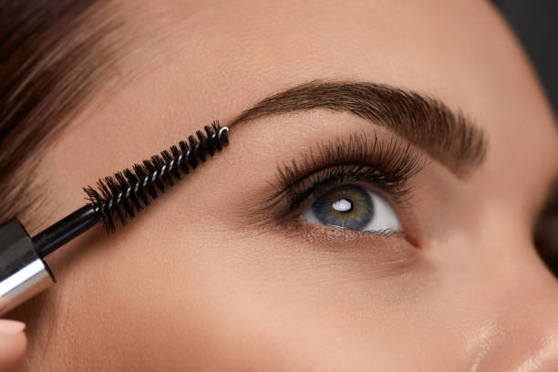 istock Beautiful Woman Eye With Long Eyelashes And Eyebrows. Makeup 947019244