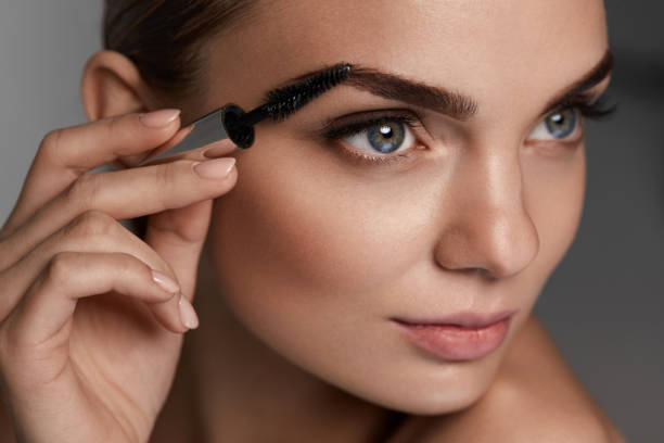istock Perfect Makeup For Beautiful Woman. Brow Care For Eyebrows 947022206