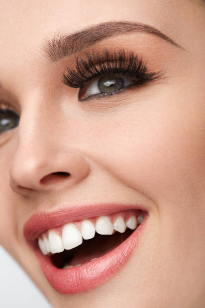 istock Closeup Of Beautiful Smiling Female Face With Perfect Makeup 947025708