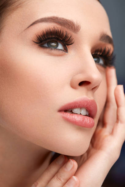 istock Face Makeup. Beautiful Woman With Long Eyelashes, Soft Skin 947025732