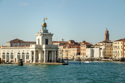 Punta della Dogana is the triangular area of Venice where the Grand Canal meets the Giudecca Canal