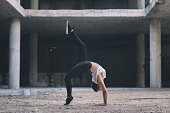 Gymnast girl acting on the street