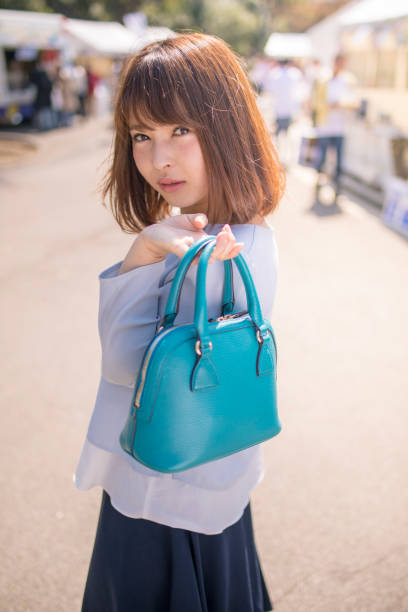 Close-Up Of Brown Bag Over White Background