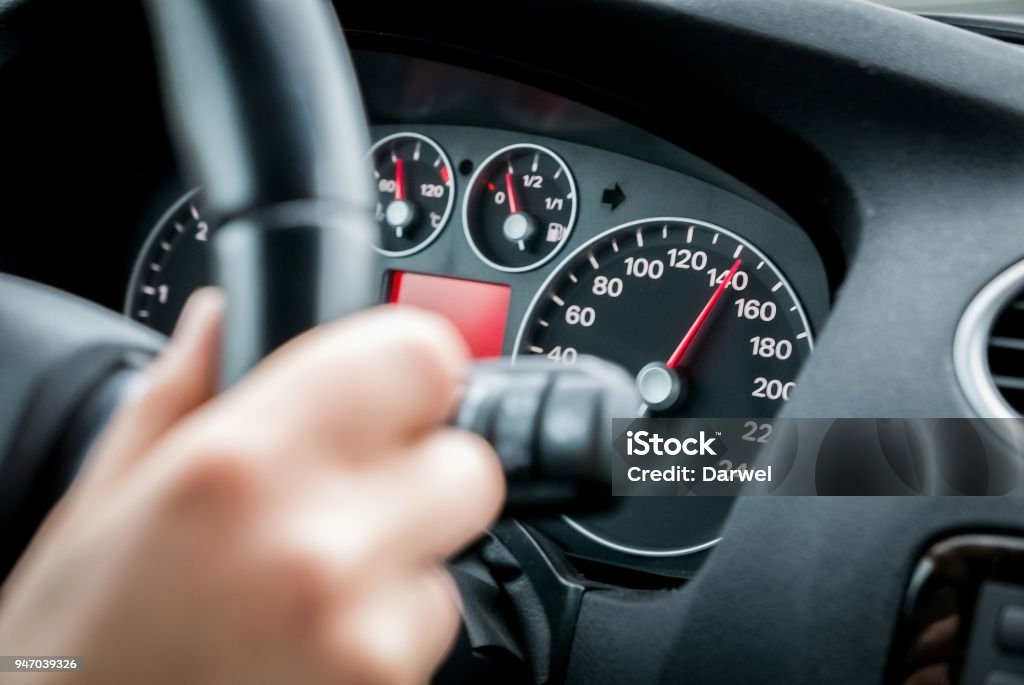 Driving car at motorway at high speed Car Stock Photo