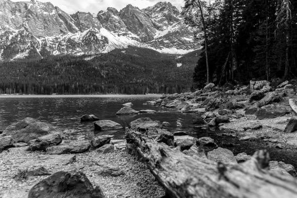 istock eibsee lake germany with the zugspitze mountain range in the background black and white 947045430