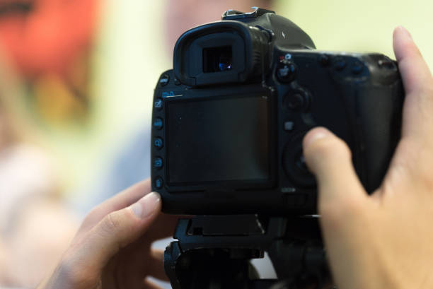 istock Photographer with dslr camera 947048964