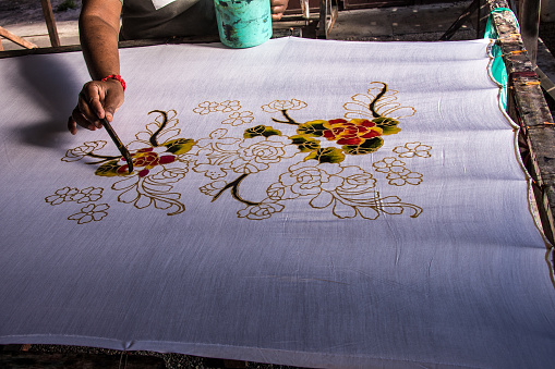 Working with the millenary Asian technique of batik