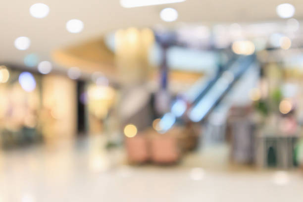 istock Abstract blur modern shopping mall interior defocused background 947054796