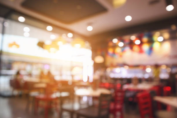 istock Restaurant cafe or coffee shop interior with people abstract defocused blur background 947054860
