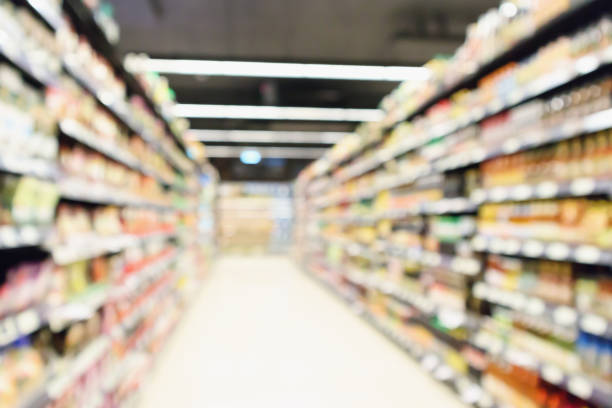 istock Abstract blur supermarket aisle defocused background 947054868