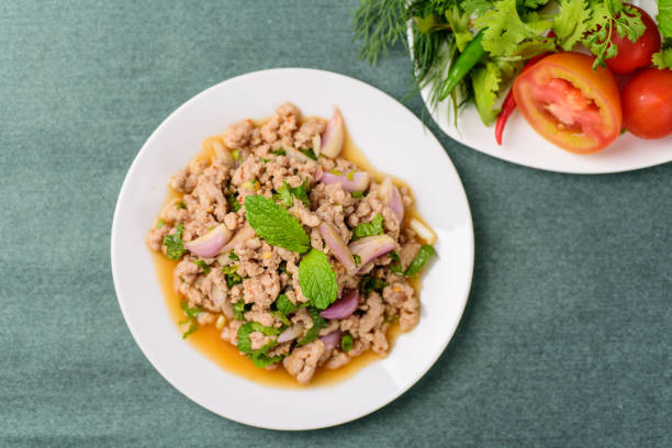 istock Spicy minced pork salad 947055076