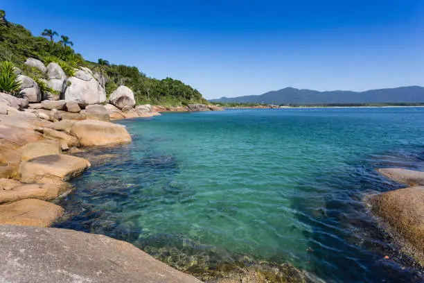 Pictures of a beautiful place called "Piscinas da Barra da Lagoa". In a beautiful day with a blue sky and a crystalline water.