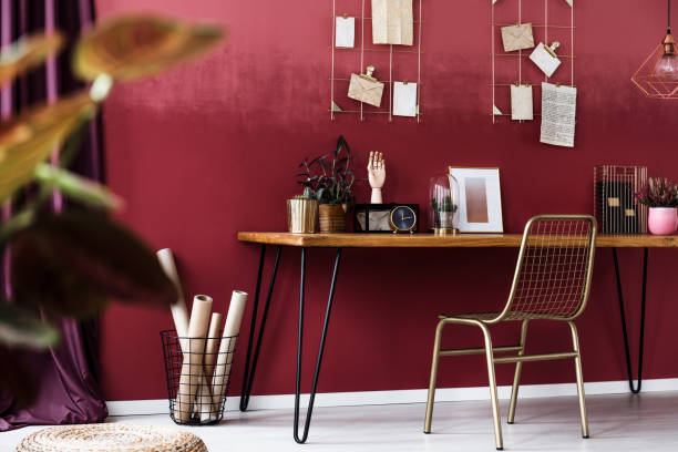 istock Gold chair in red interior 947055902