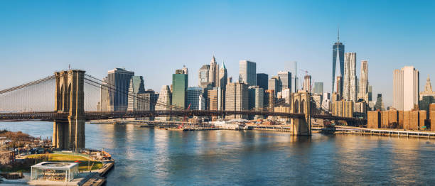 Brooklyn bridge and Manhattan at sunny day