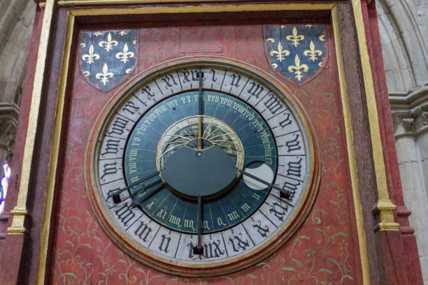 A historical clock inside St-Etienne Cathedral in Bourges, France.