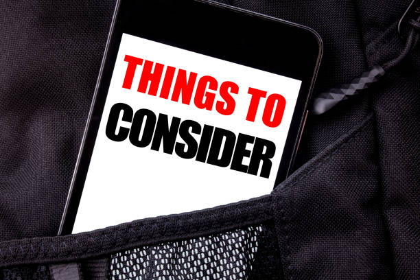 istock Handwritten text showing Things To Consider. Business concept writing for Business Knowledge Written phone mobile phone, cellphone placed in the man front jeans pocket. 947066194