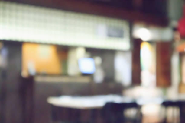 istock abstract blurred cafe restaurant with bokeh lights defocused background 947066424