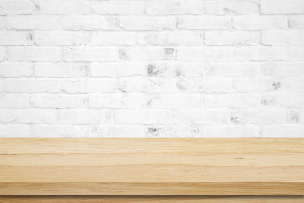 istock Empty wooden table over grunge cement wall, vintage, background, template, product display montage 947074514