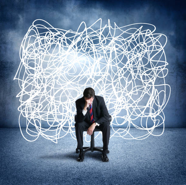 istock Distressed Man Sitting In Chair 947079418